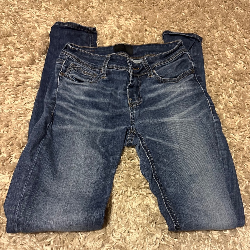 Buckle Black skinny jeans 25x32